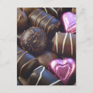 Pralinen mit rosa Folie Postkarte