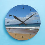 Pretty Ocean Tide Runde Wanduhr<br><div class="desc">This beautiful clock is perfect to decorate a cute beach house. Small blue waves roll up on a gorgeous beach under pretty clouds. I love the coast.</div>