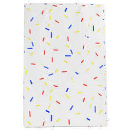 Primärfarben-Jimmy-Sprinklen-Geschenktasche Mittlere Geschenktüte