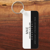 Professionelle Architektin mit halb schwarzen, hal Schlüsselanhänger (Vorderseite)