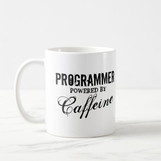Programmierer-Power durch Koffeinkaffee-Tasse Kaffeetasse (Links)