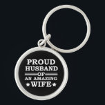 proud husband of an amazing wife schlüsselanhänger<br><div class="desc">This original proud husband of an amazing wife graphic design with awesome typography font lettering is a great birthday and Fathers day gift idea for all appreciated, special, brave, wonderful, and one-of-a-kind fathers, husbands, and dads! The best amazing and funny holiday present for your awesome dad.This design is also fitting...</div>