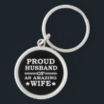 proud husband of an amazing wife schlüsselanhänger<br><div class="desc">This original proud husband of an amazing wife graphic design with awesome typography font lettering is a great birthday and Fathers day gift idea for all appreciated, special, brave, wonderful, and one-of-a-kind fathers, husbands, and dads! The best amazing and funny holiday present for your awesome dad.This design is also fitting...</div>