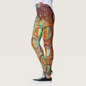 Psychedelische, hellblaue und orangefarbene Wasser Leggings (Links)