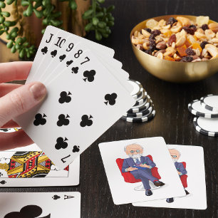 Psychologe im Anzug mit Notizblock sitzend Spielkarten