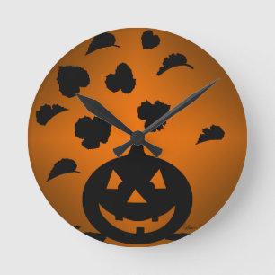 Pumpkin und Blätter Silhouette Runde Wanduhr