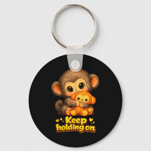 Punch-Affe mit Teddybär kuschelt und hält weiter f Schlüsselanhänger