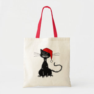 Punk Weihnachten: Zornige Katze mit Weihnachtsmann Tragetasche