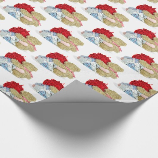 Puppe und Teddybär auf Weiß Geschenkpapier (Ecke)