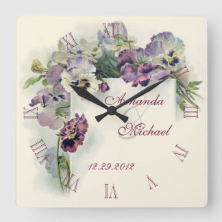 Purple pansies wedding anniversary quadratische wanduhr