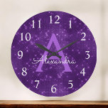 Purple Sparkle Shimmer Monogram Name & Initial Große Wanduhr<br><div class="desc">Purple Sparkle and Shimmer Monogram Name and Initial Serving Wall Clock. The Wall Clock makes the perfect gift for someone who loves gold sparkle glitter.</div>