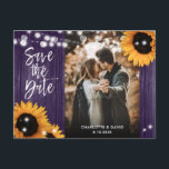 Purple Sunflower Wedding Photo Save The Date Ankündigungspostkarte<br><div class="desc">Rustic purple floral wedding photo save the date postcard featuring sunflowers and string lights on a barn wood background.</div>