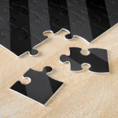 Puzzle aus schwarzem Strip (Seite)