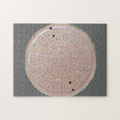Puzzle - Manhole-Abdeckung (Horizontal)