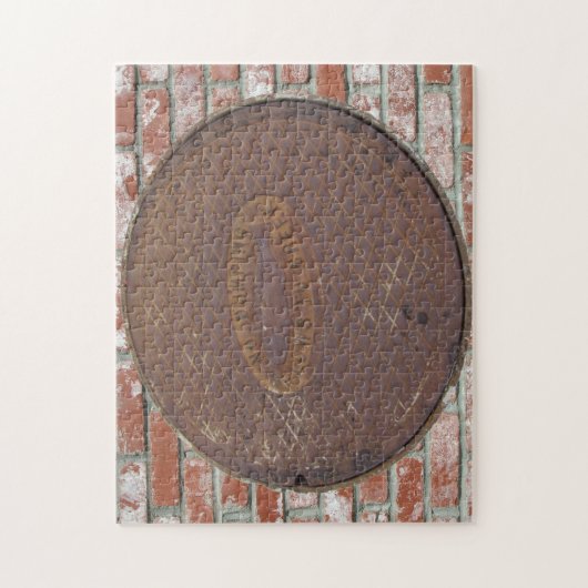 Puzzle - Manhole Cover auf Brick (Vertikal)