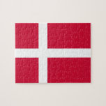 Puzzle mit der Flagge Dänemarks<br><div class="desc">Tauchen Sie ein in die dänische Kultur mit unserem fesselnden Puzzle unter der Flagge Dänemarks! Dieses Puzzle wurde mit viel Liebe zum Detail gestaltet und zeigt stolz die ikonische Flagge Dänemarks, auch Dannebrog genannt. Die Fahne zeichnet sich durch ein einfaches Design eines roten Feldes mit einem weißen skandinavischen Kreuz aus,...</div>