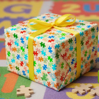 Puzzlespiel bessert Packpapier aus