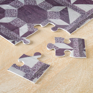 Puzzlespiel - Steppdeckenmuster - Spulen des Puzzle