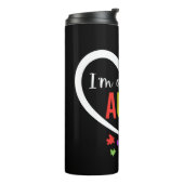 Puzzleteile aus farbigen Autismus Thermosbecher (Nach links gedreht)