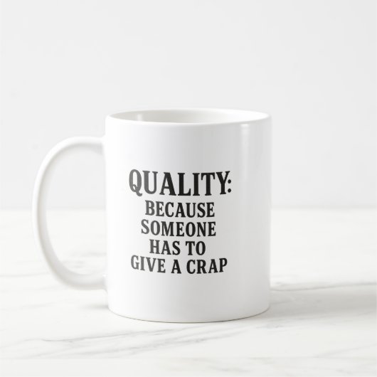 Quality: Because Someone has to... Kaffeetasse (Links)