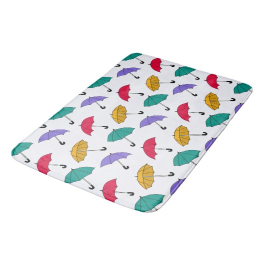 Quirky farbenfrohe Tumbling Umbrells Muster Badematte (Schrägansicht)