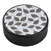 Quirky-Guinea Eishockey Puck (3/4)
