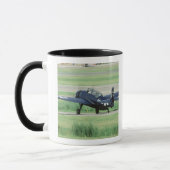 Rächer-Marine-Fördermaschinentorpedo Grummans Tasse (Links)