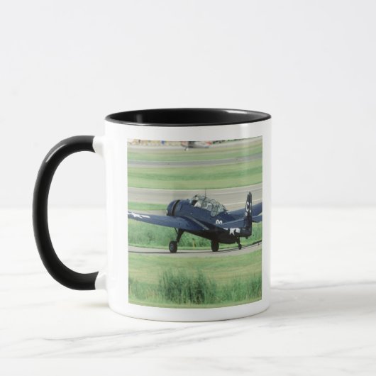Rächer-Marine-Fördermaschinentorpedo Grummans Tasse (Links)