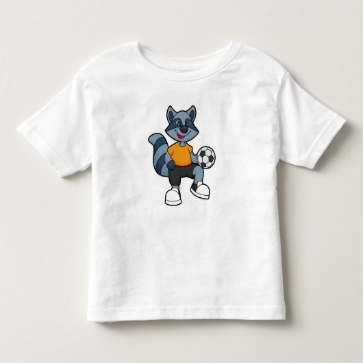Racoon als Fußballspieler mit Fußball Kleinkind T-shirt (Vorderseite)