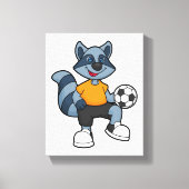 Racoon als Fußballspieler mit Fußball Leinwanddruck (Vorderseite)