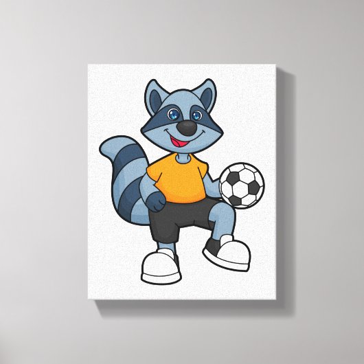 Racoon als Fußballspieler mit Fußball Leinwanddruck (Vorderseite)