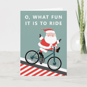 Radfahrer fährt Weihnachtsgrußkarte Feiertagskarte