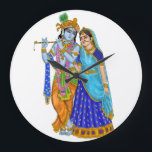 Radha Krishna Clock Große Wanduhr<br><div class="desc">Elegant Radha Krishna clock designed to bring divine love and spiritual harmony to your home decor. Perfect for living rooms,  meditation spaces,  temples,  and gifting.</div>
