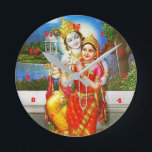 RADHA Krishna Flöten-Instrument-Gottheit heilig Runde Wanduhr<br><div class="desc">Art: Rund (Medium) Es ist Zeit, Ihre Lieblingskunst, Fotos und Text mit einer kundenspezifischen runden Wanduhr von Zazzle vorzuführen. Gekennzeichnet in zwei Größen, wird diese Wanduhr vibrierend mit AcryliPrint®HD Prozess gedruckt, um die hochwertigste Anzeige jedes möglichen Inhalts sicherzustellen. Bestellen Sie diese kundenspezifische runde Wanduhr für Ihre Wände oder geben Sie...</div>