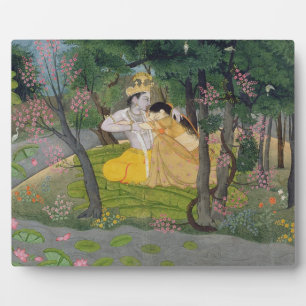 Radha und Krishna umarmen in einem blühenden Hain Fotoplatte