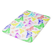 Rainbow Colored Butterflies Flying Badematte (Schrägansicht)