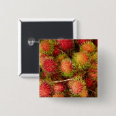 Rambutan Fruit auf dem Can Duoc Market Button (Vorne & Hinten)