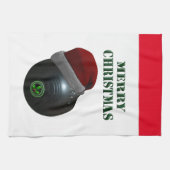 Rasenschale mit einer Weihnachtsmannmütze, Geschirrtuch (Horizontal)