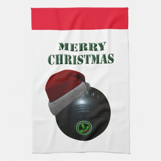 Rasenschale mit einer Weihnachtsmannmütze, Geschirrtuch (Vertikal)