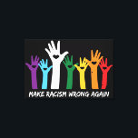 Rassismus in den Herzen schießen Leinwanddruck<br><div class="desc">Farbenfrohe Anti-Rassismus-Gestaltung mit einem "Regenbogen" von Händen mit Herzklopfen und weißem Text,  der den Rassismus wieder falsch macht.</div>