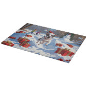Rat Terrier läuft im Schnee mit Weihnachtshut Schneidebrett (Ecke)