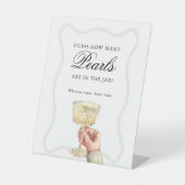 Rate, wie viele Perlen Game Pearls und Prosecco Sockelschild (Vorderseite)