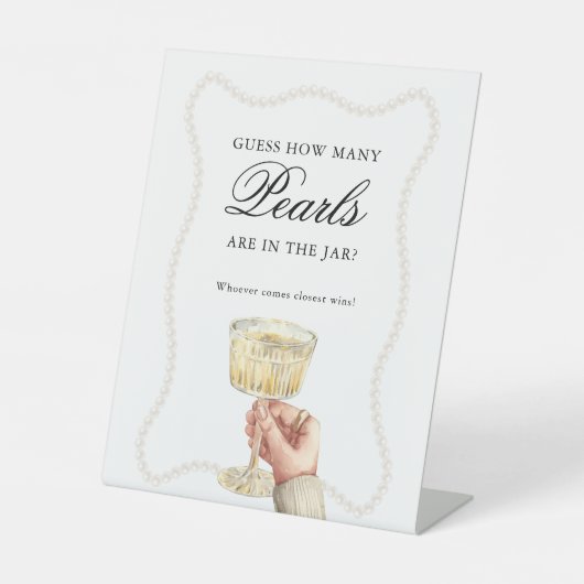 Rate, wie viele Perlen Game Pearls und Prosecco Sockelschild (Vorderseite)