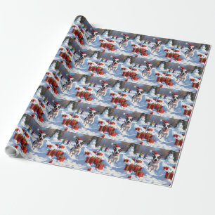 Ratt Terrier läuft im Schnee mit Weihnachtsmütze Geschenkpapier