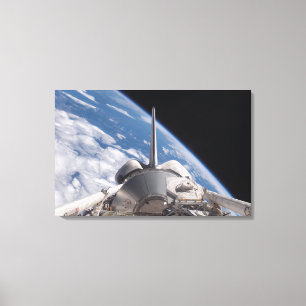 Raumfähre-Entdeckung backdropped durch Erde Leinwanddruck