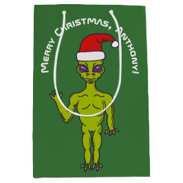 Raumfahrt-Alien in einer Weihnachtsmannmütze Perso Mittlere Geschenktüte