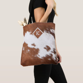 Realistic brown and white cowhide texture monogram tasche