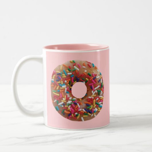 Realistischer Donut mit farbigen Sprinklern pink Zweifarbige Tasse (Links)