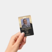 Realtor Agent in Schwarz und Gold Ausweis (Handheld)