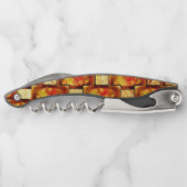 Rechteckige Teller, geschnitzt und farbig, orange Kellnermesser (Rückseite)